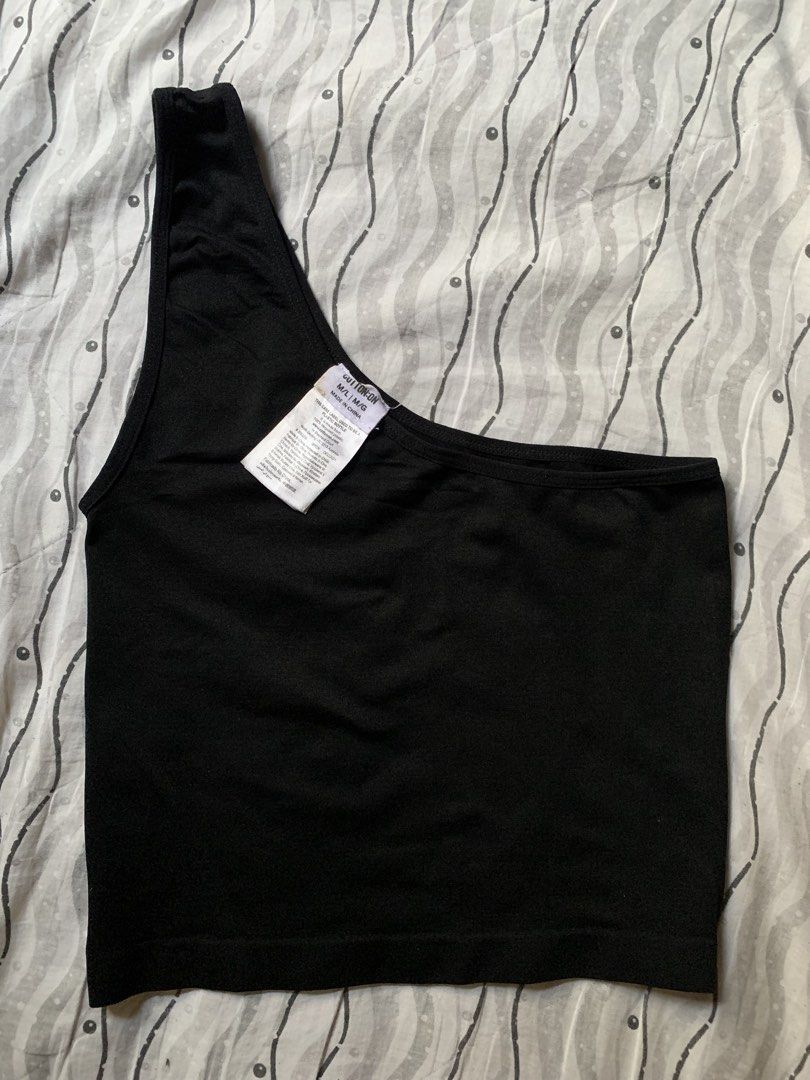 Cotton On Black One-Shoulder Crop Top (Category: Others Tops) located in Manila. Submitted by cthxrn (Listing ID 1444287755, Image 1). Description: Cotton On Black One-Shoulder Crop Top •Size: M/L (based on tag) •Color: Black •Excellent condition / Like new •Stretchy and comfortable fabric •Trendy one-shoulder asymmetrical design •No visible flaws on the top itself • Small washable mark on the tag •Perfect for casual wear, parties, or layering • 