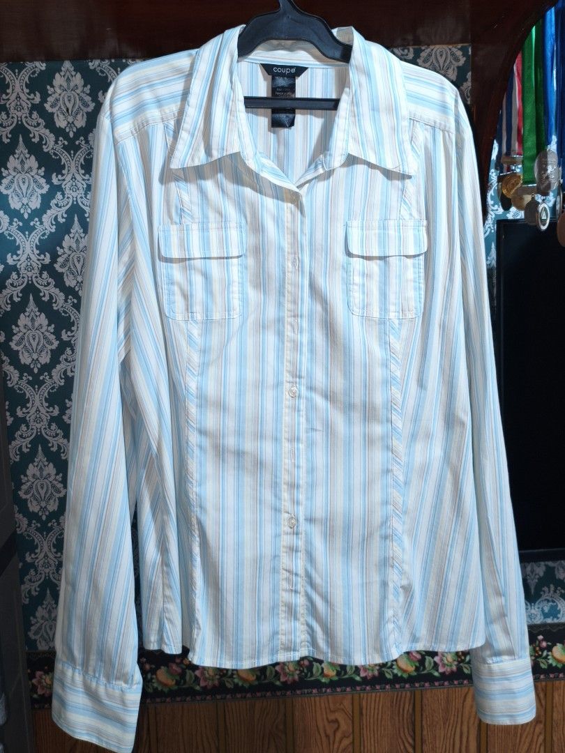 Coupé Longsleeve Polo (Category: Longsleeves) located in Quezon City. Submitted by _clxde (Listing ID 1444188333, Image 1). Description: - Worn Once - Great for Casual and Formal Attire - Baby Blue Color - Made from 65% Cotton, 32% Nylon, and 3% Spandex - Size Large on Tag Sleeve Length: 25.4" Length: 24.4" Width: 21.4" (From Pit to Pit).
