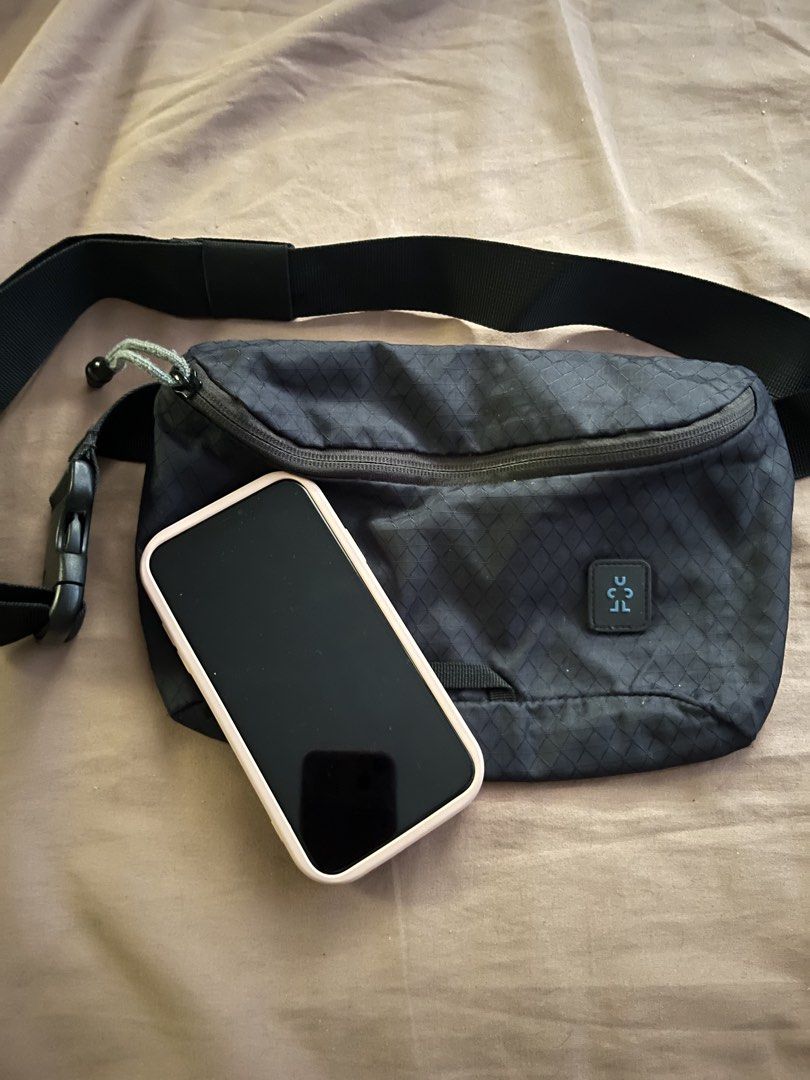 Crumpler Fanny Pack / Waist Bag (Category: Cross-body Bags) located in Manila. Submitted by subz013 (Listing ID 1444188601, Image 2). Description: - Black Crumpler fanny pack - Unique diamond pattern fabric - Spacious main zip compartment - Adjustable strap with secure buckle closure - Comfortable mesh padding on the back - Fits phone and other daily essentials - Great for travel or everyday adventures.