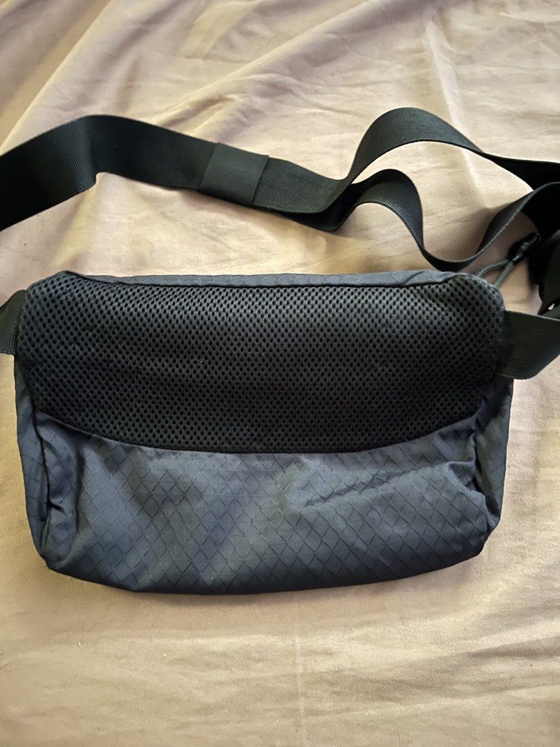 Crumpler Fanny Pack / Waist Bag (Category: Cross-body Bags) located in Manila. Submitted by subz013 (Listing ID 1444188601, Image 3). Description: - Black Crumpler fanny pack - Unique diamond pattern fabric - Spacious main zip compartment - Adjustable strap with secure buckle closure - Comfortable mesh padding on the back - Fits phone and other daily essentials - Great for travel or everyday adventures.