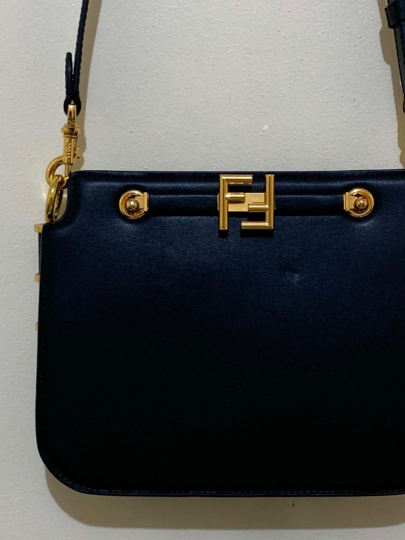 Fendi Black Touch Bag Sling Crossbody (Category: Luxury Bags & Wallets) located in Valenzuela. Submitted by choi_0711 (Listing ID 1444168931, Image 2). Description: - Fendi Touch leather bag - Iconic gold-tone FF logo clasp - Adjustable strap for customized comfort - Versatile classic design suitable for daily wear or special events With code (for interested buyers only) One minor press mark only, not very noticeable NGA .
