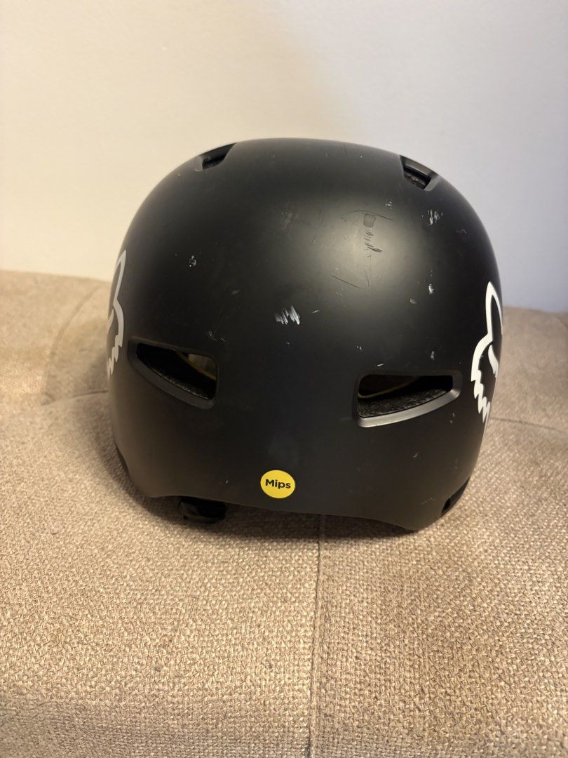 Fox Racing MIPS Helmet (Category: Bicycles) located in Manila. Submitted by og1022 (Listing ID 1444120367, Image 3). Description: - Black Fox Racing helmet - Features MIPS technology for enhanced safety - Shows some scuffs and scratches from previous use - Ideal for biking and various action sports - Ready for its next adventure!.
