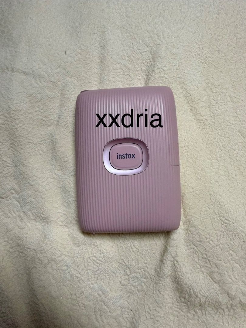 Fujifilm Instax Mini Link Printer with Case (negotiable) (Category: Cameras) located in Caloocan City. Submitted by xxdria01947 (Listing ID 1444118053, Image 3). Description: - Pink Fujifilm Instax Mini Link printer - Includes black protective case - Wirelessly prints photos directly from your smartphone - Compact and portable design - Ideal for capturing and sharing memories at parties and events.
