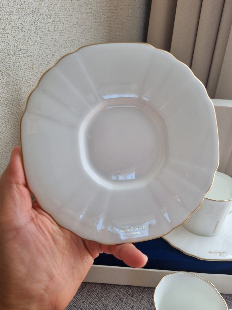 Givenchy Classic White with Gold Rim Tea Cup Set 2 duos (Category: Coffee & Tea Tableware) located in Porac. Submitted by tokyohome (Listing ID 1444119021, Image 2). Description: Available again ♥️ Classic White with Gold Rim Tea Cup Set Php 1,700 only / take all At its best price On hand ♥️ 2 sets in a box Cup (w 7.3 x h 7cm) Saucer (14.8cm) ♥️ Unused with box ⚠️ 1 cup with minimal flaw on the rim # 48 #givenchyphilippines #givenchyph #givenchyc