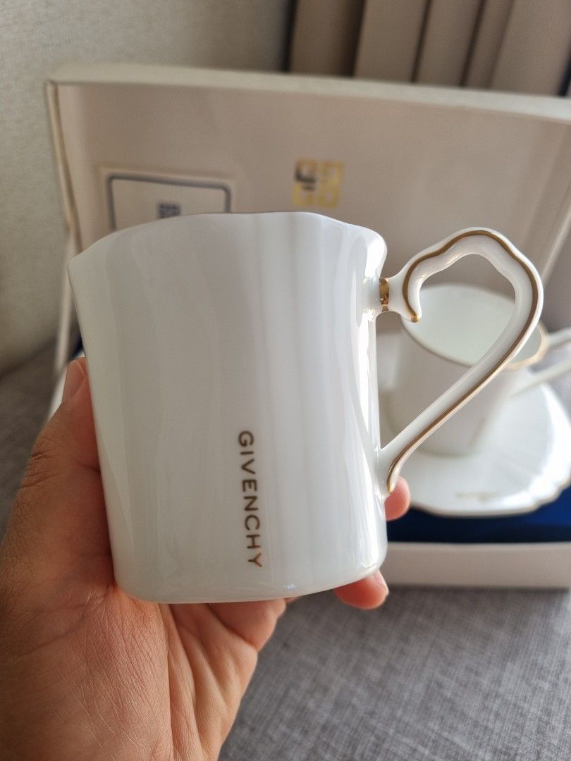 Givenchy Classic White with Gold Rim Tea Cup Set 2 duos (Category: Coffee & Tea Tableware) located in Porac. Submitted by tokyohome (Listing ID 1444119021, Image 1). Description: Available again ♥️ Classic White with Gold Rim Tea Cup Set Php 1,700 only / take all At its best price On hand ♥️ 2 sets in a box Cup (w 7.3 x h 7cm) Saucer (14.8cm) ♥️ Unused with box ⚠️ 1 cup with minimal flaw on the rim # 48 #givenchyphilippines #givenchyph #givenchyc