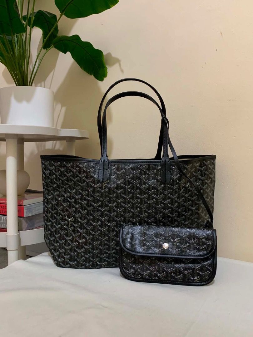 Goyard Black Monogram Tote Bag with Pouch (Category: Luxury Bags & Wallets) located in Valenzuela. Submitted by choi_0711 (Listing ID 1444168314, Image 1). Description: - Classic black Goyard tote bag - Features iconic Goyard monogram pattern - Comes with a matching smaller pouch - Ideal for everyday use or travel - Spacious interior - Durable leather handles and trim - A timeless and stylish accessory Good as new po, no issues or rubs With white