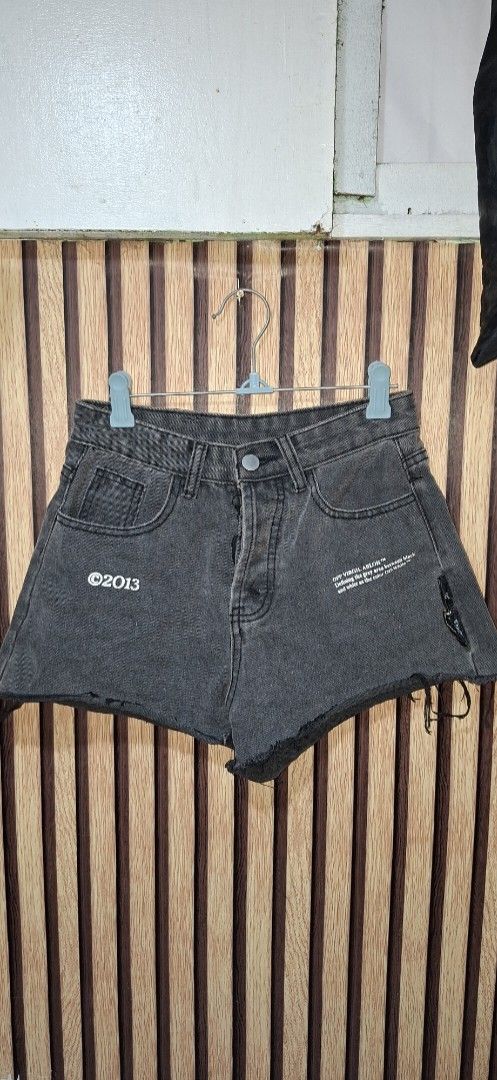 Grey Denim Shorts with Distressed Hem (Category: Shorts) located in Valenzuela. Submitted by thriftlets (Listing ID 1444158908, Image 1). Description: - Grey denim shorts - Distressed hem detail - Button and zip closure size 26.