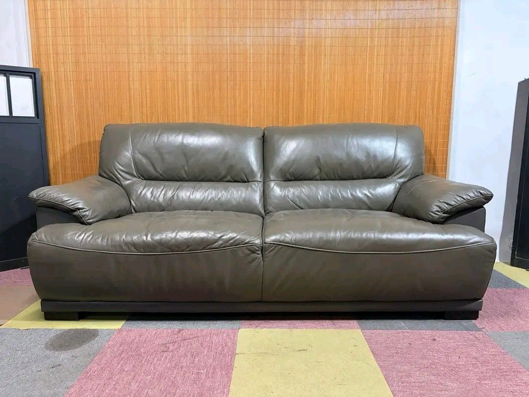 Grey Leather 2-Seater Sofa (Category: Sofas) located in Manila. Submitted by eloizavill76462 (Listing ID 1444129216, Image 3). Description: Modern 3-Seater Leather Sofa BIG & BULKY!!! SOFT & COMFY!!! THICK GENUINE LEATHER!!! 77L x 38W x 16H seat height inches Sandalan height 35 inches In good condition.