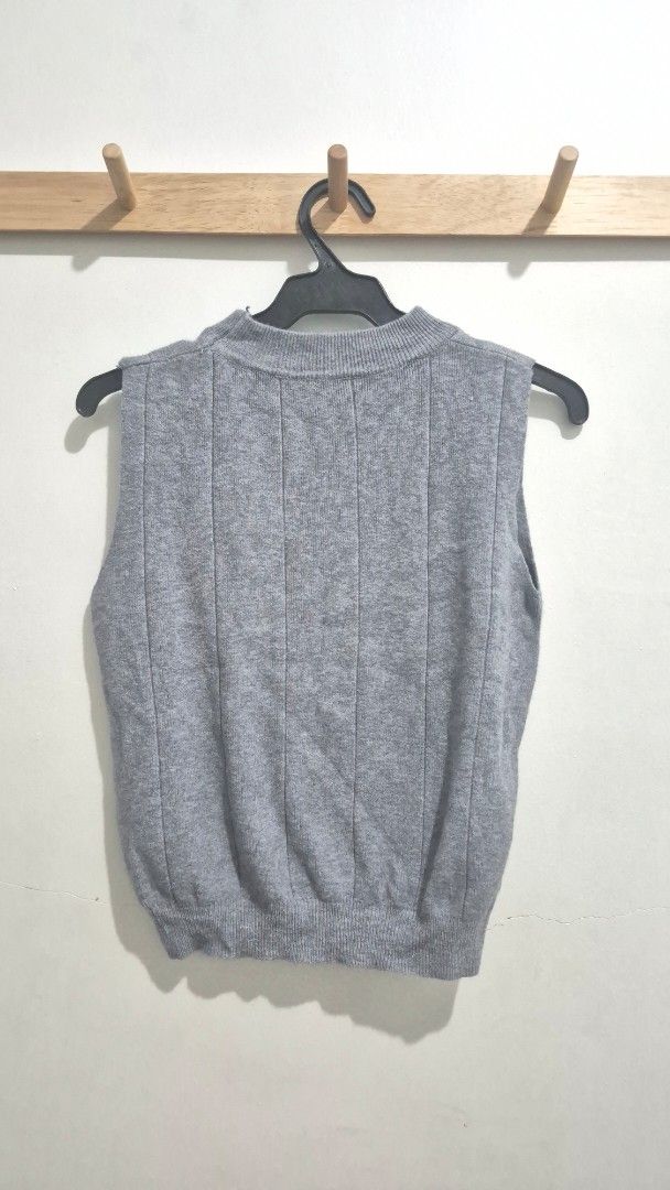 Grey Ribbed Knit Mock Neck Sweater Vest (Category: Sleeveless) located in Makati City. Submitted by chukothriftshop (Listing ID 1444200151, Image 2). Description: - Grey sweater vest - Ribbed knit texture - Sleeveless design - Ideal for layering - Bought from BKK Market.