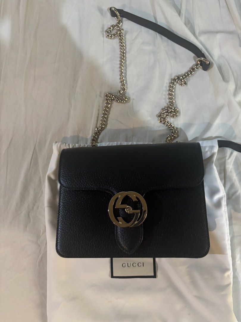 GUCCI Gucci Interlocking Small Black Leather Shoulder Bag (Category: Luxury Bags & Wallets) located in Makati City. Submitted by u.4.ria (Listing ID 1444238167, Image 2). Description: - Authentic Gucci Interlocking Bag - Color: Black Leather - Hardware: Gold - Size: Small - Condition: Good overall, exterior is good, interior is clean - Includes: Original dust bag - Measurements: - Width: 20cm - Height: 16cm - Depth: 7cm - Strap Drop: 58cm.
