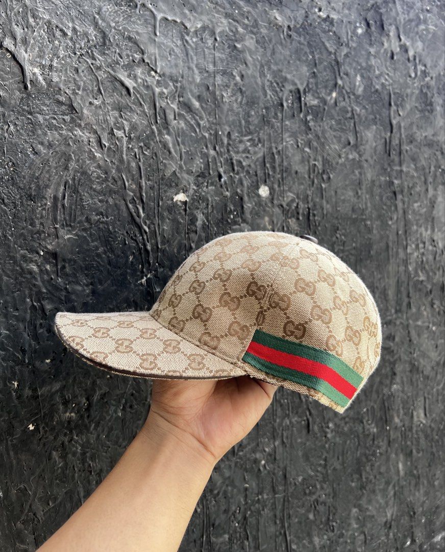 Gucci hat (Category: Activewear) located in Manila. Submitted by thrift2mill (Listing ID 1444148297, Image 2). Description: Gucci GG Canvas Baseball Hat Size:Medium 58cm Issue:None .