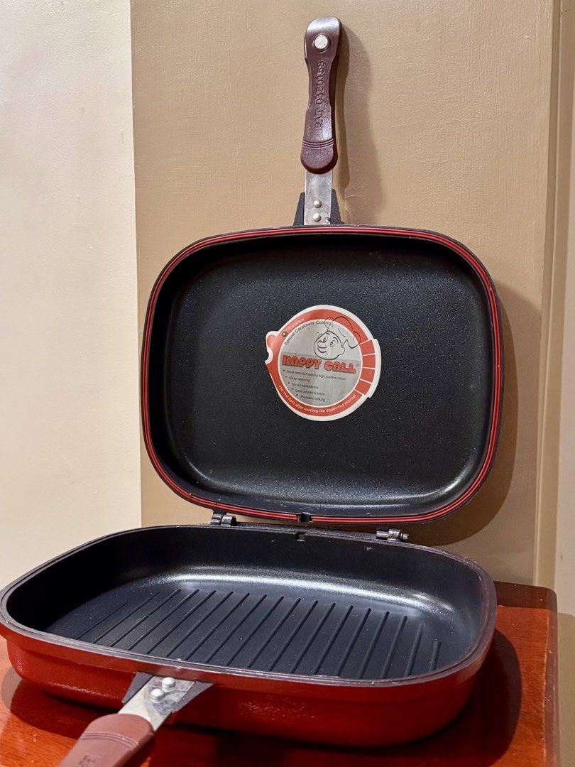 Happycall: Double Grill Pan (Category: Cookware & Accessories) located in Tayug. Submitted by pearly2124 (Listing ID 1444179825, Image 3). Description: - Original price: 1, 800.00 - Selling for 1, 200.00 INCLUSIVE of shipping (negotiable) - Does NOT come with the box - Happycall Double Grill Pan in Red - Made in Korea - Ideal for grilling meats, vegetables, and sandwiches - Seals in flavor and moisture - Significantly reduces smoke during cooking