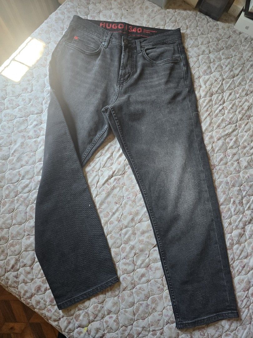 HUGO BOSS 340 Responsible Denim Jeans (Category: Jeans) located in Quezon City. Submitted by jb0516 (Listing ID 1444261280, Image 1). Description: - Grey wash HUGO BOSS jeans - Features 'HUGO 340 Responsible Denim' detail on the side - Classic five-pocket styling - Button and zip fly closure - Perfect for comfortable everyday wear.