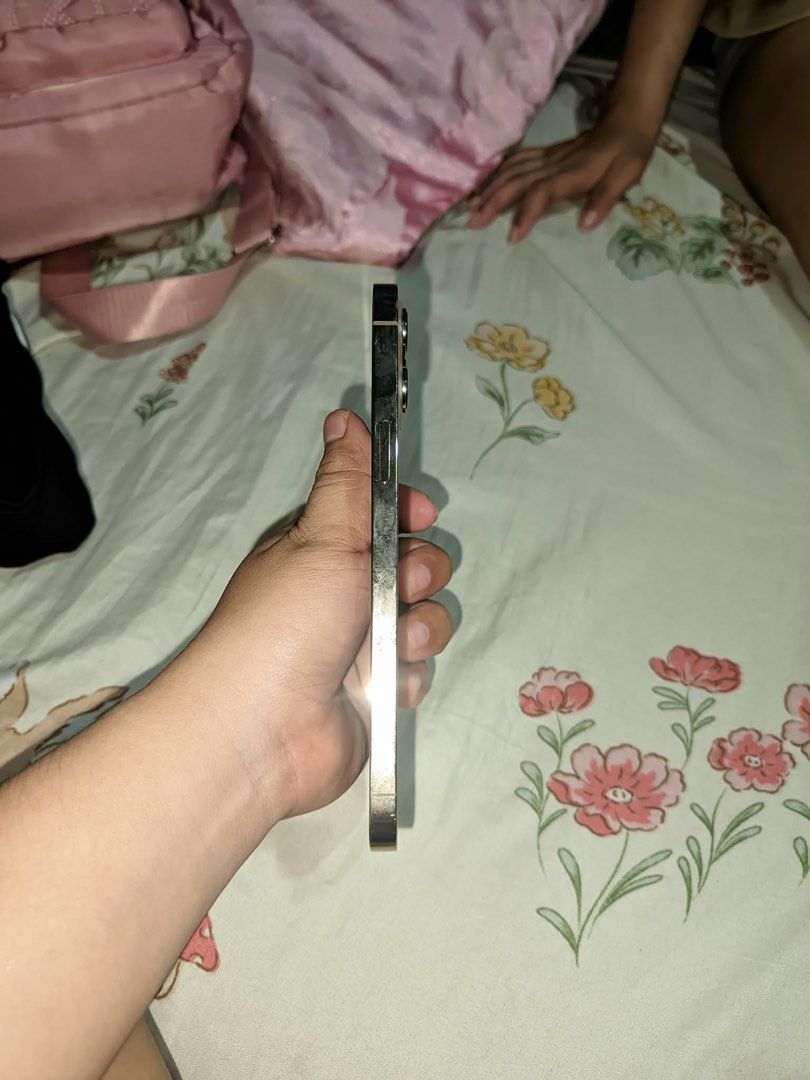 IPHONE 12 PRO MAX 256GB (Category: iPhone 12 Series) located in Baler. Submitted by ajidulay.07 (Listing ID 1444265102, Image 3). Description: FOR SALE ✅ IPHONE 12 PRO MAX ✅ 256GB ✅ 100% BH ✅ TRUETONE WORKING ✅ FACE ID WORKING ✅ GOOD SPEAKER ✅ MAKINIS PA KONTING DENTS LANG SA GILID ✅ MALINAW BOTH CAM LALO NA .5 ✅ TELEPHOTO WORKING GOOD ✅ GENUINE APPLE PARTS 😍 ✅ NO UNKNOWN PARTS PO! ✅ UNIT, NEW CASE AND NEW INSTALLED TEMPERED, AND CORD 🫶 ☑️ ISSU