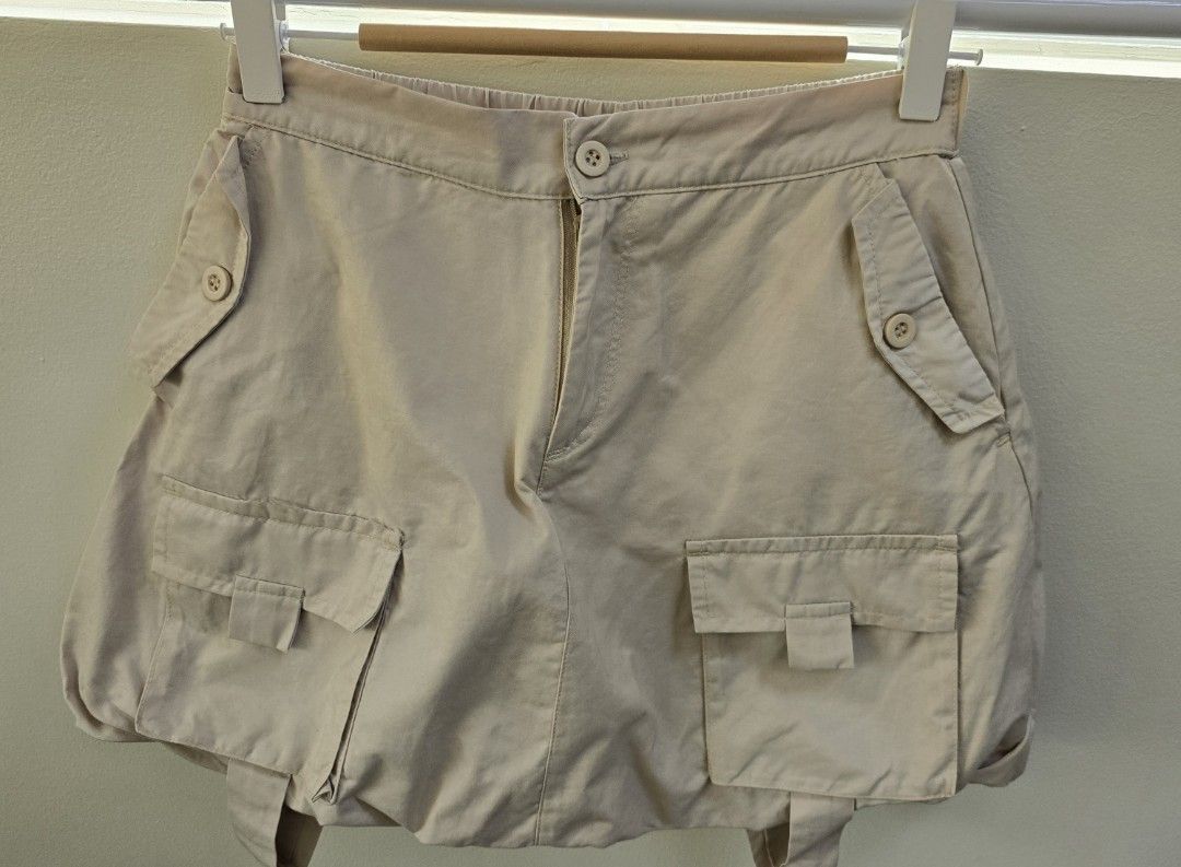Just Kids Beige Cargo Bubble Skirt with Multiple Pockets (Category: Babies & Kids Fashion) located in Quezon City. Submitted by bringjoy (Listing ID 1444196468, Image 1). Description: - Cute beige cargo skirt - Multiple pockets on front and sides - Elastic waistband at the back for comfort - Zipper and button closure - Perfect for casual outfits, great for mix n match OOTDs - Waist measures approximately 14 inches across. with inner shorts.
