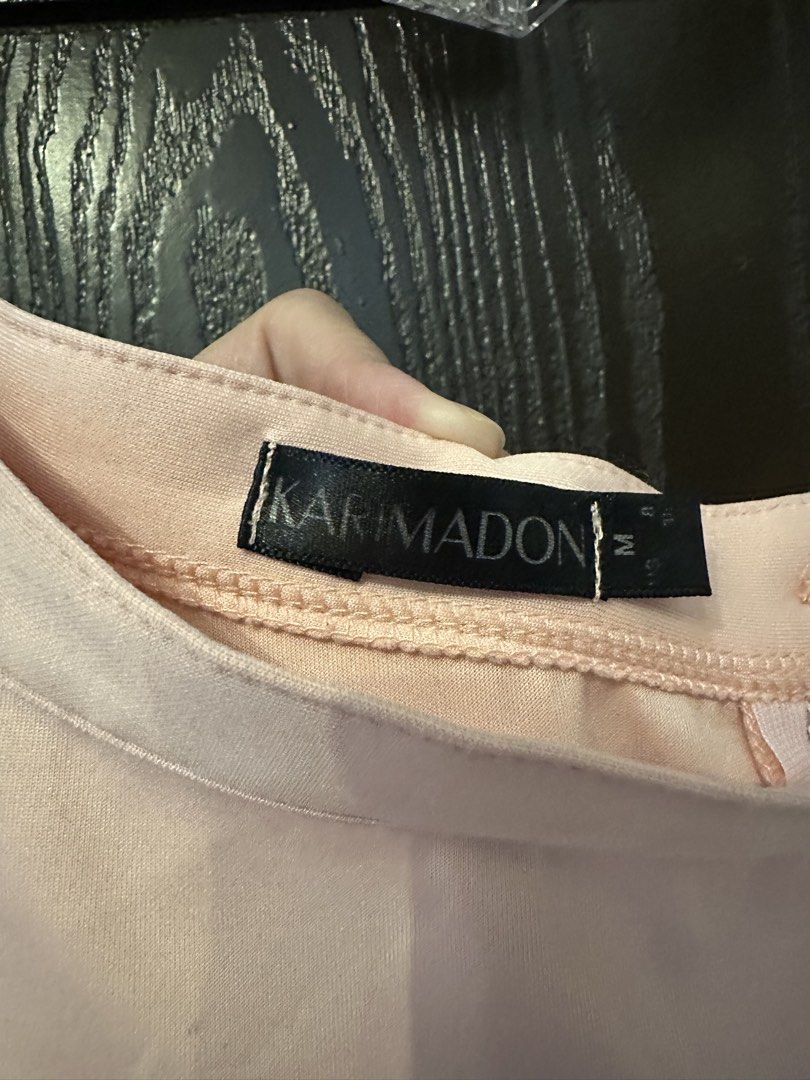 KARIMADON Pink Midi Skirt Size M (Category: Skirts) located in Muntinlupa City. Submitted by zanne426 (Listing ID 1444181094, Image 2). Description: - KARIMADON midi skirt - Soft pink shade - Size M - Simple and versatile design - Perfect for dressing up or down - Easy to pair with various tops.