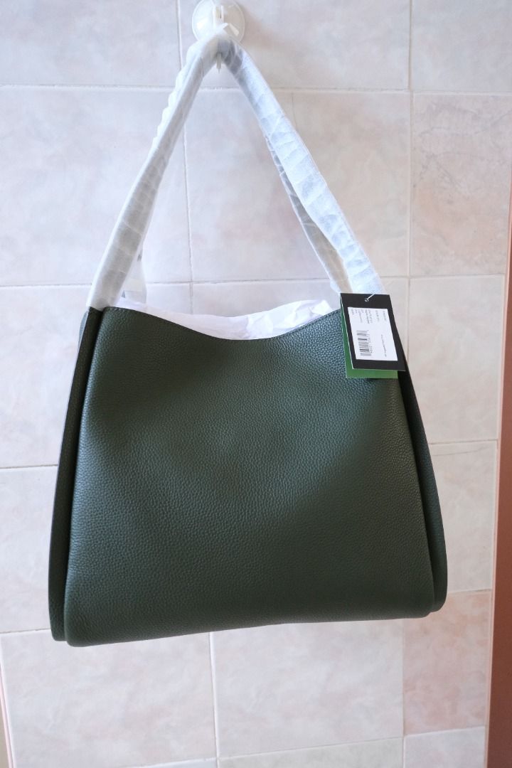 Kate Spade Knott Pebbled Leather Shoulder Bag - Bonsai Tree (Category: Luxury Bags & Wallets) located in Tagbilaran City. Submitted by chinomandam (Listing ID 1444227755, Image 2). Description: - Brand new Kate Spade Knott shoulder bag - Bonsai tree green - Pebbled leather - Comes with original tags - Spacious interior, ideal for everyday use - Never been used rfs: Too big for my body.