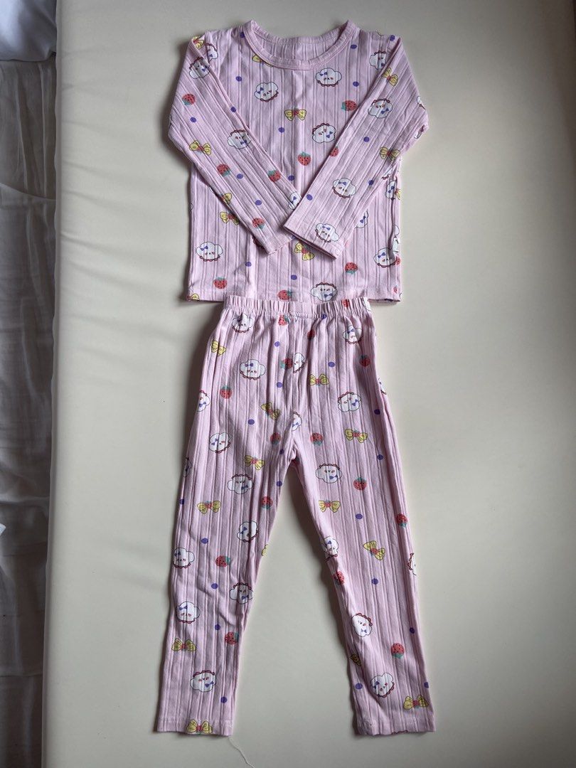 Kids Pink Cloud Strawberry Pajama Set (Category: Babies & Kids Fashion) located in Quezon City. Submitted by grmvi (Listing ID 1444183581, Image 1). Description: - Adorable pink pajama set for kids - Features a ribbed texture - Fun print: clouds, strawberries, and bows - Long sleeves and long pants - Perfect for sleeping and lounging - Sweet and comfortable design.