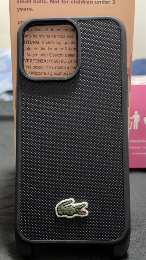 Lacoste Original Phone case for iPhone 15 Pro max (Category: Cases & Sleeves) located in Manila. Submitted by jonelllliiii (Listing ID 1444287974, Image 1). Description: Original Lacoste Phone case For iPhone 15 pro max Only the case 100% Authentic Slightly used.