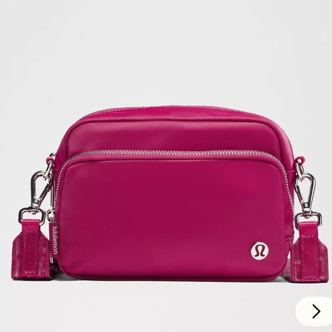 Lululemon Everywhere Crossbody Bag Magenta (Category: Cross-body Bags) located in Bulacan. Submitted by bnbig (Listing ID 1444291710, Image 1). Description: - So pretty Lululemon Crossbody Bag - Vibrant magenta color - Multiple zippered compartments for organization - Adjustable strap with textured pattern - Ideal for everyday use, travel, or workouts Guaranteed Authentic 💯 Reminders: 1. Actual color may differs because of the lightning when the