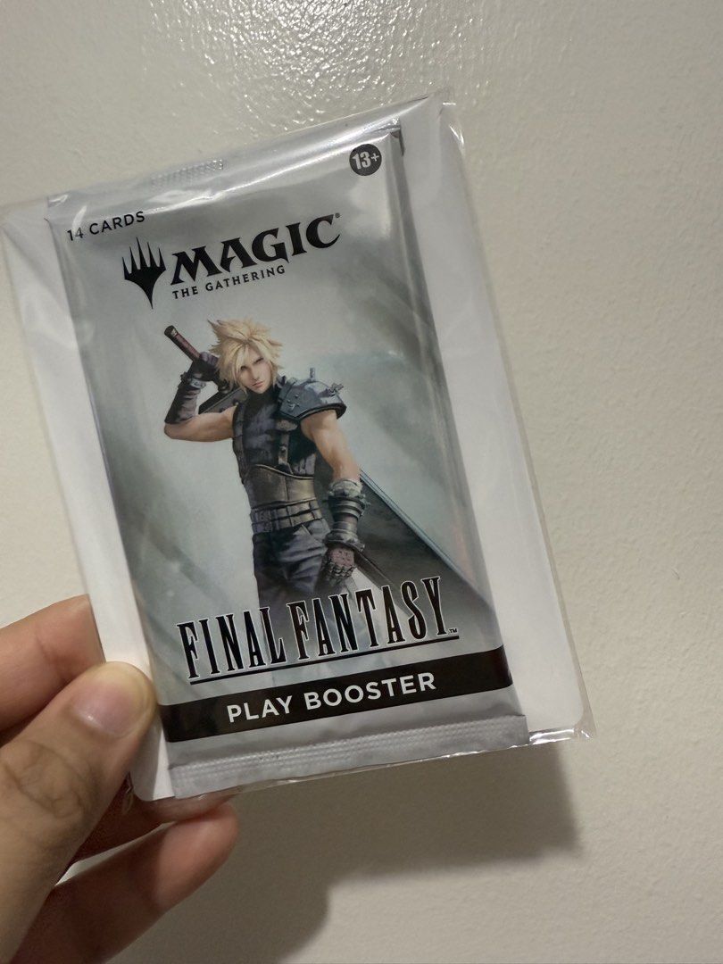 Magic The Gathering Final Fantasy Play Booster Pack (Category: Card Packs) located in Manila. Submitted by mollichie (Listing ID 1444219585, Image 1). Description: - Magic The Gathering x Final Fantasy collaboration booster pack - Contains 14 cards - Features iconic Cloud Strife and Sephiroth artwork - Suitable for ages 13 and up.