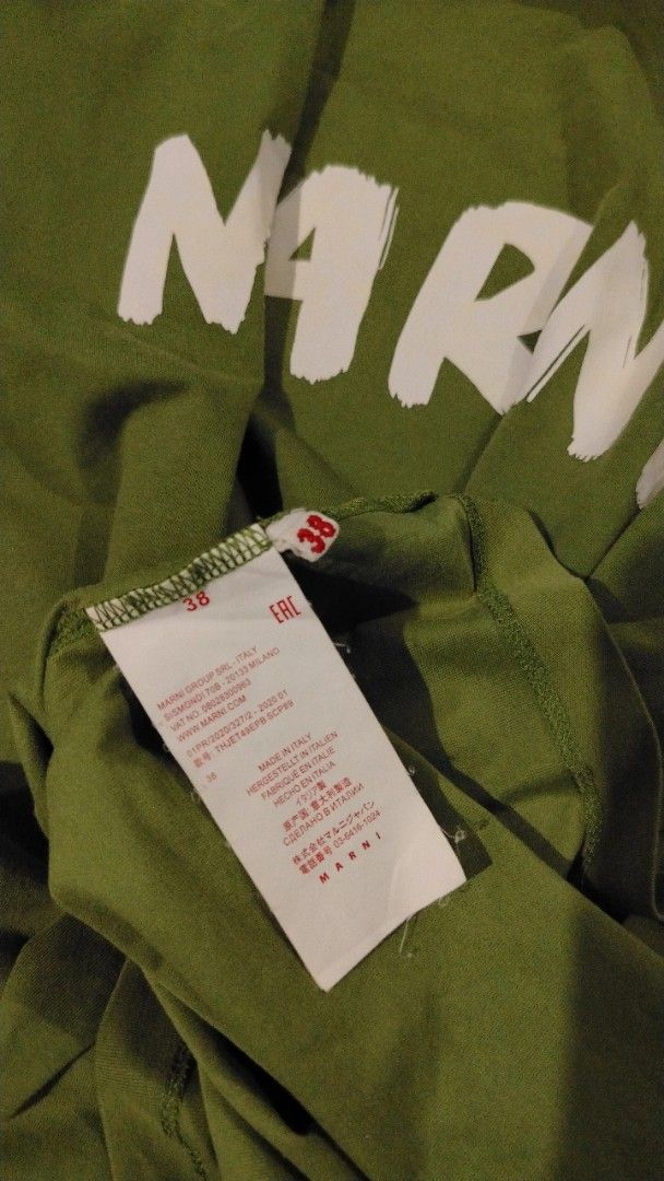 Marni Green T-shirt Size 38 (Category: Tshirts & Polo Shirts ) located in Cavite. Submitted by ukaynglahat (Listing ID 1444240293, Image 2). Description: - Authentic Marni T-shirt - Color: Green - Features bold white MARNI lettering on the chest - Size: 38 - Made in Italy - Ideal for everyday casual wear.