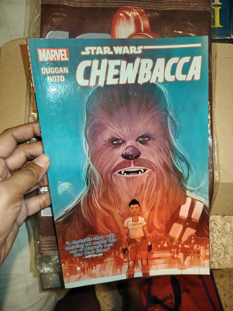 Marvel Star Wars Chewbacca Comic Book by Duggan & Noto (Category: Comics & Manga) located in Cainta. Submitted by badet0521 (Listing ID 1444171336, Image 1). Description: - Star Wars Chewbacca comic book - Story by Gerry Duggan - Art by Phil Noto - Features Chewbacca and a young girl on a mission - Exciting adventure set in a galaxy far, far away - Perfect for any Star Wars fan's collection.