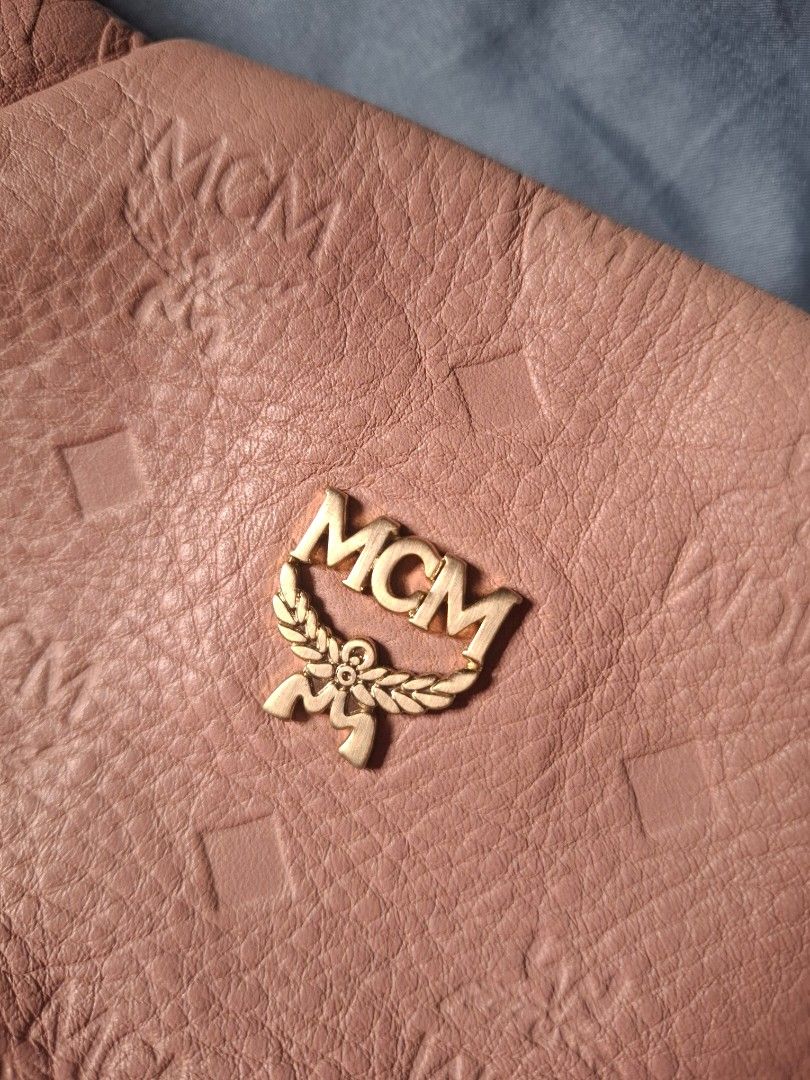 MCM Embossed Monogram Leather Slouched Hobo (Category: Luxury Bags & Wallets) located in Manila. Submitted by yelenarari (Listing ID 1444118823, Image 3). Description: Authentic MCM Embossed Monogram Leather Slouched Hobo good condition rfs: need funds.