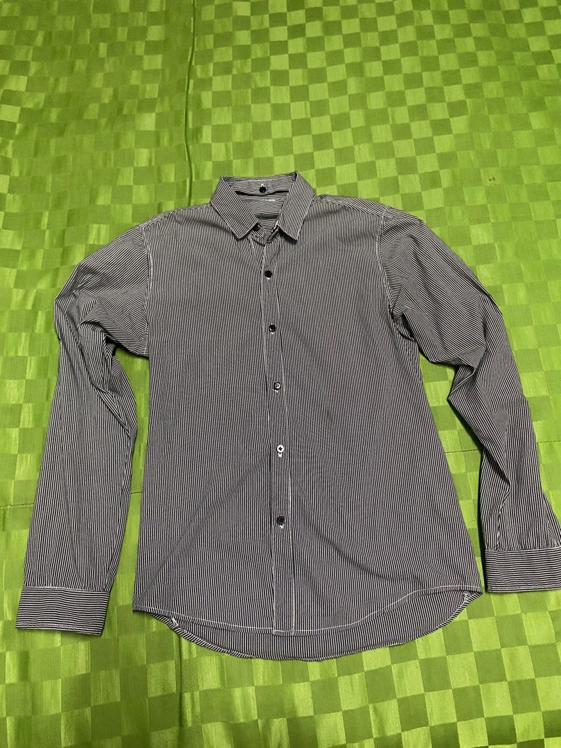 Men's Striped Long Sleeve Button-Up Shirt (Category: Tshirts & Polo Shirts ) located in Quezon City. Submitted by virginsuicide333 (Listing ID 1444226622, Image 1). Description: - Classic black and white striped long sleeve shirt - Button-up front with black buttons - Roll-up sleeve tabs for adjustable length - Removable collar - Fits S-M.