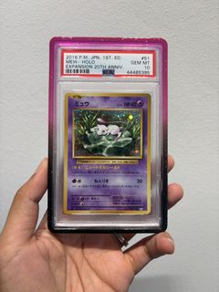 PSA 10 MEW-HOLO EXP.20TH ANNIV-1ST ED. 051/087 CP6 GEM MINT, Toys