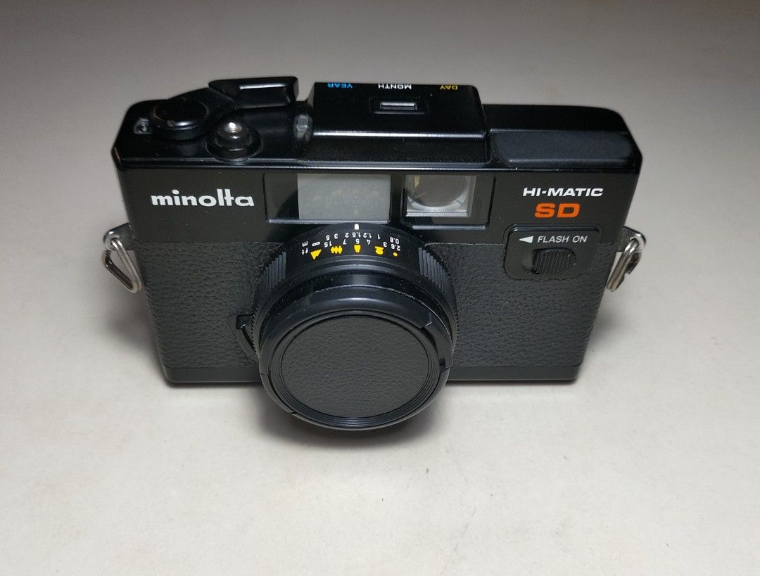 Minolta Hi-Matic SD Film Camera (Category: Cameras) located in Paranaque City. Submitted by zenfalcon.e8286d (Listing ID 1444178860, Image 2). Description: Ready to use... -Good working condition -Clad recently -Flash working -Clean lens and VF -Exposure:Auto (Accurate) -Uses Zone focus -Working timer -All functions are working -Comes with 2AA batteries lens cap and strap .