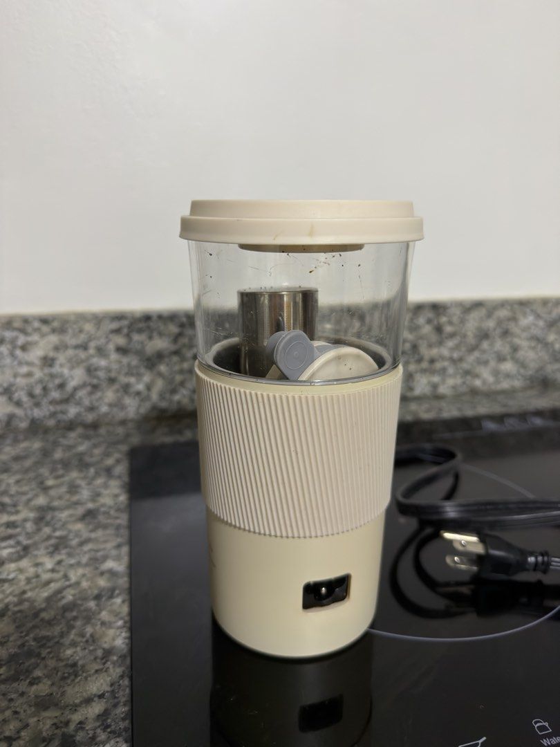 Multipurpose Electric Milk Foam Frother Maker (Category: Coffee & Tea Tableware) located in Quezon City. Submitted by lexieshuu162243 (Listing ID 1444135516, Image 3). Description: - Portable electric mug - Heats and stirs your drinks - Perfect for coffee, tea, milk tea, and milk foam - Includes a cancel button - Comes with a power cord - Ideal for on-the-go convenience.