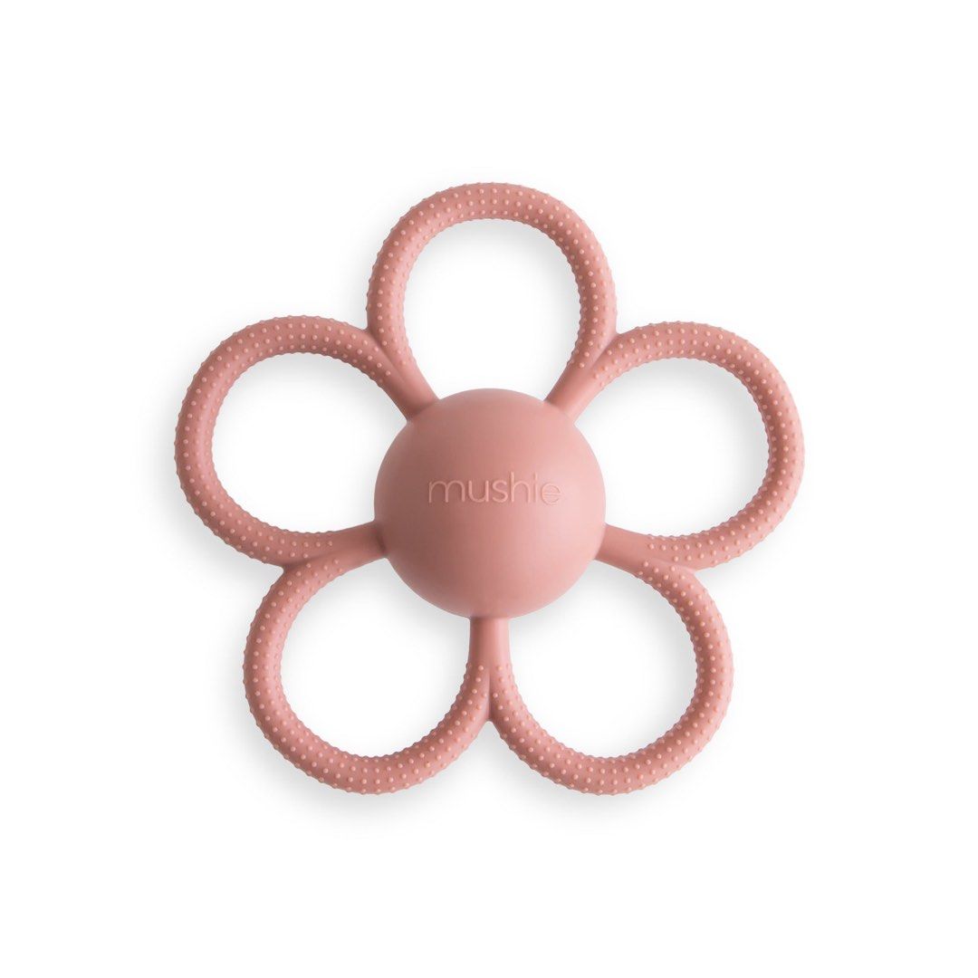 Mushie Silicone Daisy Rattle Flower Teether Rose Pink (Category: Soothers & Pacifiers) located in Bulacan. Submitted by tinparco (Listing ID 1444133073, Image 1). Description: 🩷Good as new 🩷Authentic Mushie product 🩷Gently used and thoroughly cleaned.🩷Made from soft, textured silicone. 🩷Easy for babies to grip. 🩷Soothes sore gums during teething. .