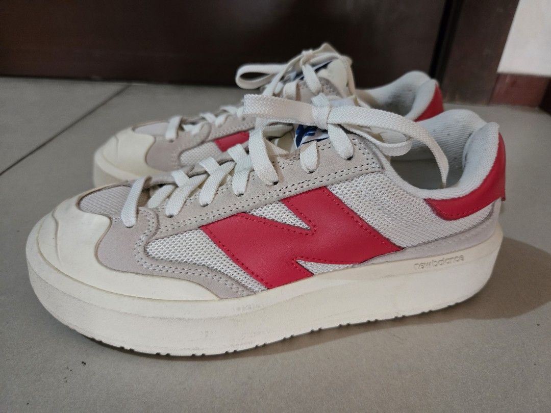 New Balance CT30 sneakers (Category: Sneakers) located in Quezon City. Submitted by mgdeclutters (Listing ID 1444186578, Image 2). Description: - Classic New Balance CT30 sneakers - Color: Cream, grey, and red accents - Closure: Lace-up - Style: Comfortable for everyday wear and casual outfits.