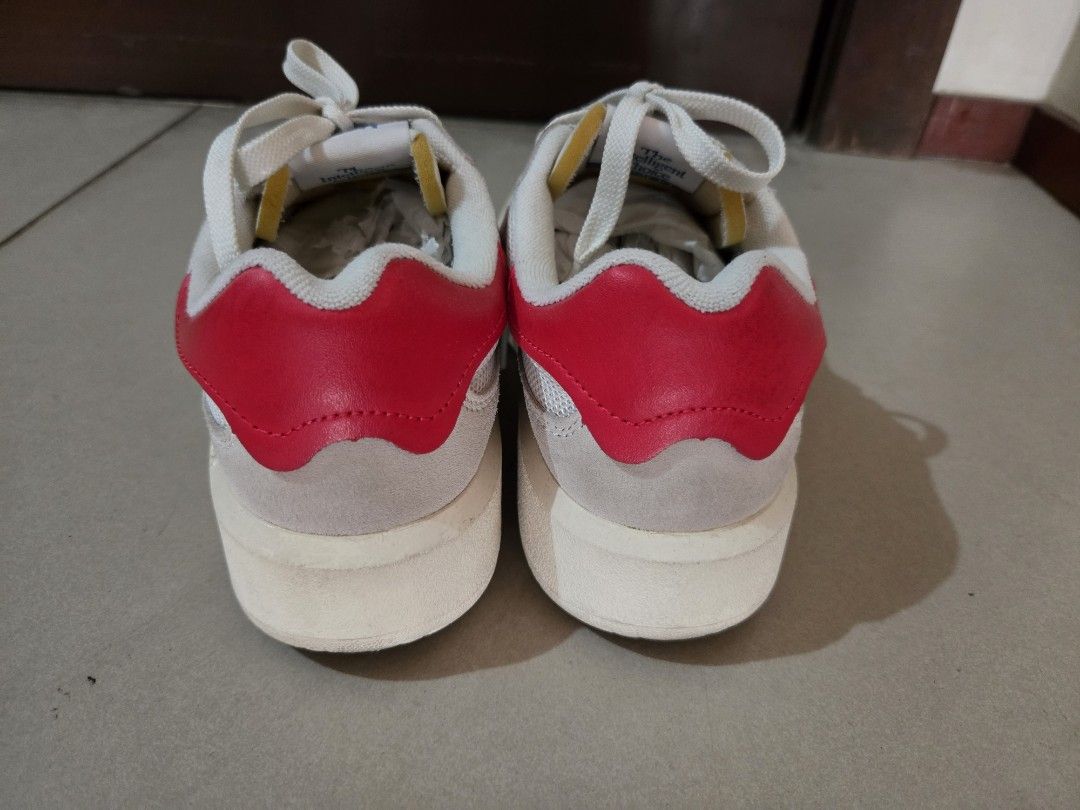 New Balance CT30 sneakers (Category: Sneakers) located in Quezon City. Submitted by mgdeclutters (Listing ID 1444186578, Image 3). Description: - Classic New Balance CT30 sneakers - Color: Cream, grey, and red accents - Closure: Lace-up - Style: Comfortable for everyday wear and casual outfits.