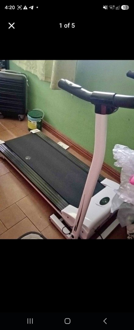 New Life Treadmill - White and Black (Category: Cardio & Fitness Machines) located in Manila. Submitted by ezehzzyboy (Listing ID 1444258504, Image 1). Description: - Brand new Life treadmill - Sleek white frame with black running belt - Compact design, ideal for home workouts - Fully functional and in great working condition - Ready for a new home!.