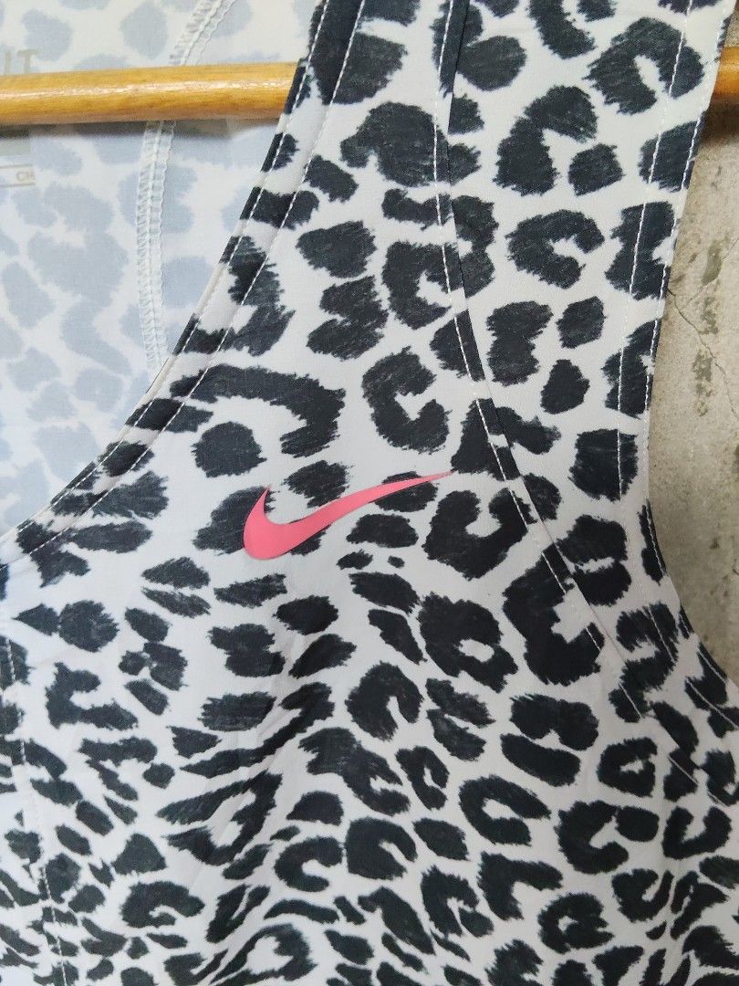 Nike Dri-Fit Leopard Print Tank Top (Category: Activewear) located in City of Isabela. Submitted by jasheverything (Listing ID 1444272173, Image 3). Description: - Nike Dri-Fit tank top - All-over leopard print design - Bright pink Nike logo on chest - Made in Cambodia - Ideal for workouts and casual wear Excellent Condition 750+SF.