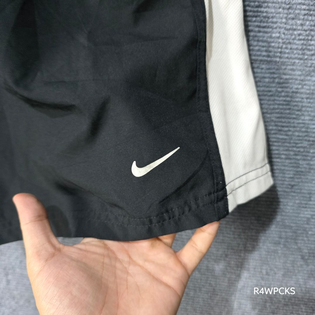 NIKE FIT DRI BLACK WHITE SHORTS (Category: Shorts) located in San Mateo. Submitted by r4wpcks (Listing ID 1444194380, Image 3). Description: Size on Tag: L Best Fit: 28 - 34 Waist: 28 - 34 inches Length: 19 inches Leg Hole / Hem: 13 inches Condition: 9/10 Color Rate: 9/10 Issue: Signs of use on reflective markings COLOR MAY VARY DUE TO LIGHTING Location: San Mateo Rizal, near Marikina J&T/Lalamove courier, shipping fee should be handled by the bu