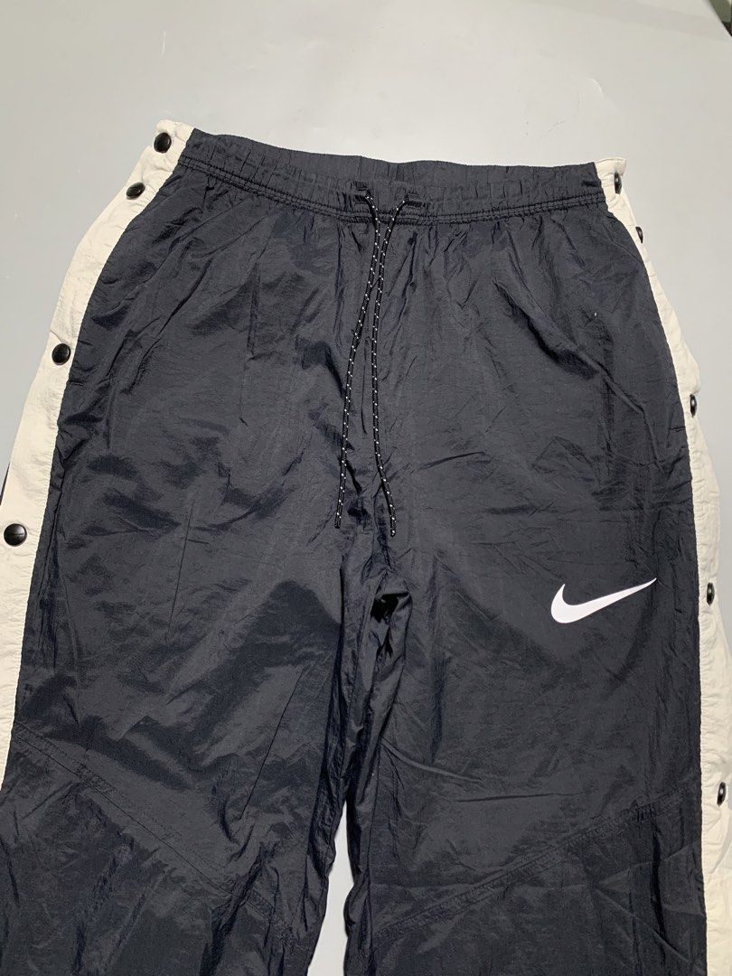 NIKE TEAR AWAY NYLON JOGGER PANTS (Category: Joggers) located in Taguig. Submitted by thehookv1 (Listing ID 1444225797, Image 2). Description: NIKE TEAR AWAY NYLON JOGGER PANTS SIZE SMALL 28-34 WAISTLINE 39 LENGTH GOOD AS NEW AUTHENTIC TAGUIG DM ME .