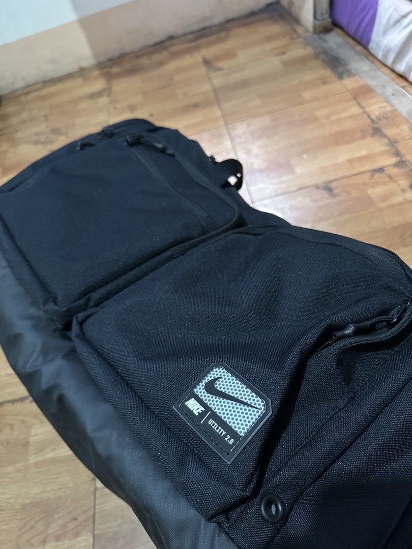 Nike Utility 2.0 Black Duffel Bag (51L) (Category: Sling Bags) located in Manila. Submitted by vench02jua72322 (Listing ID 1444292079, Image 3). Description: - Nike Utility 2.0 Duffel Bag 51L - Multiple front pockets for easy access - Spacious main compartment - Separate insulated compartment (perfect for gym/travel) - Durable material - Includes handles and adjustable shoulder strap.