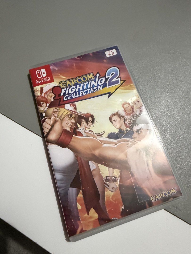 Nintendo Switch Capcom Fighting Collection 2 Game (Category: Nintendo) located in Manila. Submitted by deklutterph (Listing ID 1444285513, Image 1). Description: - Capcom Fighting Collection 2 for Nintendo Switch - Features a variety of classic Capcom fighting games - Perfect for fighting game enthusiasts - Comes with original case.