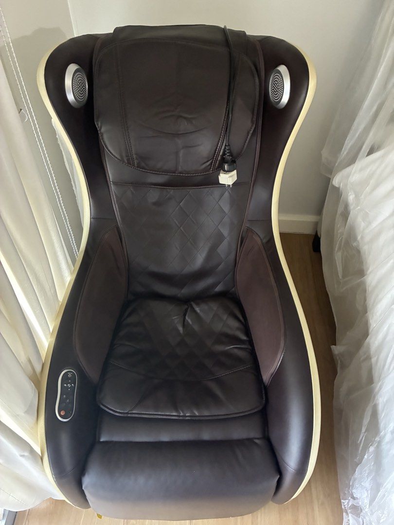 Ogawa massage chair with Speakers (Category: Massage Devices) located in Manila. Submitted by jeyjeyang (Listing ID 1444223064, Image 1). Description: Brown leather massage chair. Has built-in speakers at the headrest. Control panel on the side for settings. Footrest is also included. Great for relaxing at home. No issue.
