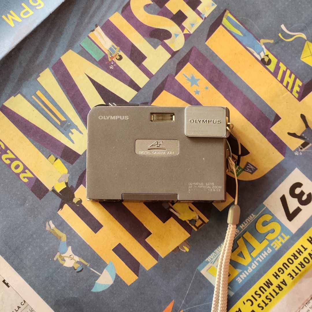 Olympus AZ-1 Digital Camera (Rare Digicam) (Category: Cameras) located in Bulacan. Submitted by h3nrpny (Listing ID 1444253219, Image 3). Description: Olympus AZ-1 Digital Camera (Rare Digicam) Selling my rare Olympus AZ-1 digital camera. Fully functional and in good condition. Perfect for collectors, digicam enthusiasts, and those looking for authentic Y2K-style photos. Inclusions: • Olympus AZ-1 Camera Unit • xD Picture Card • Original Olympus 