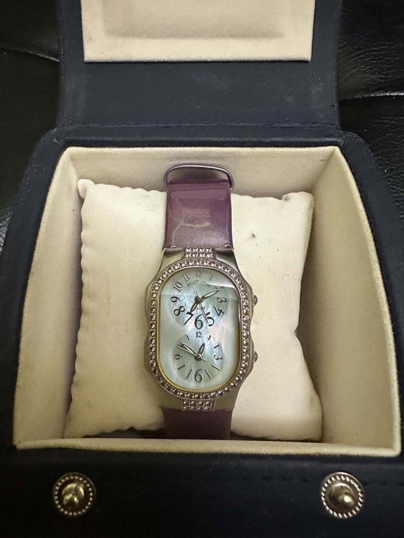 Philip Stein Watch (Category: Luxury Watches) located in Quezon City. Submitted by reyna.1106 (Listing ID 1444132169, Image 1). Description: Full Set Pre loved Philip Stein Teslar Mother of Pearl Dual dial Amethyst Gem-set Bezels Stainless Steel Quartz with original violet patent strap plus 5 original Philip Stein straps .