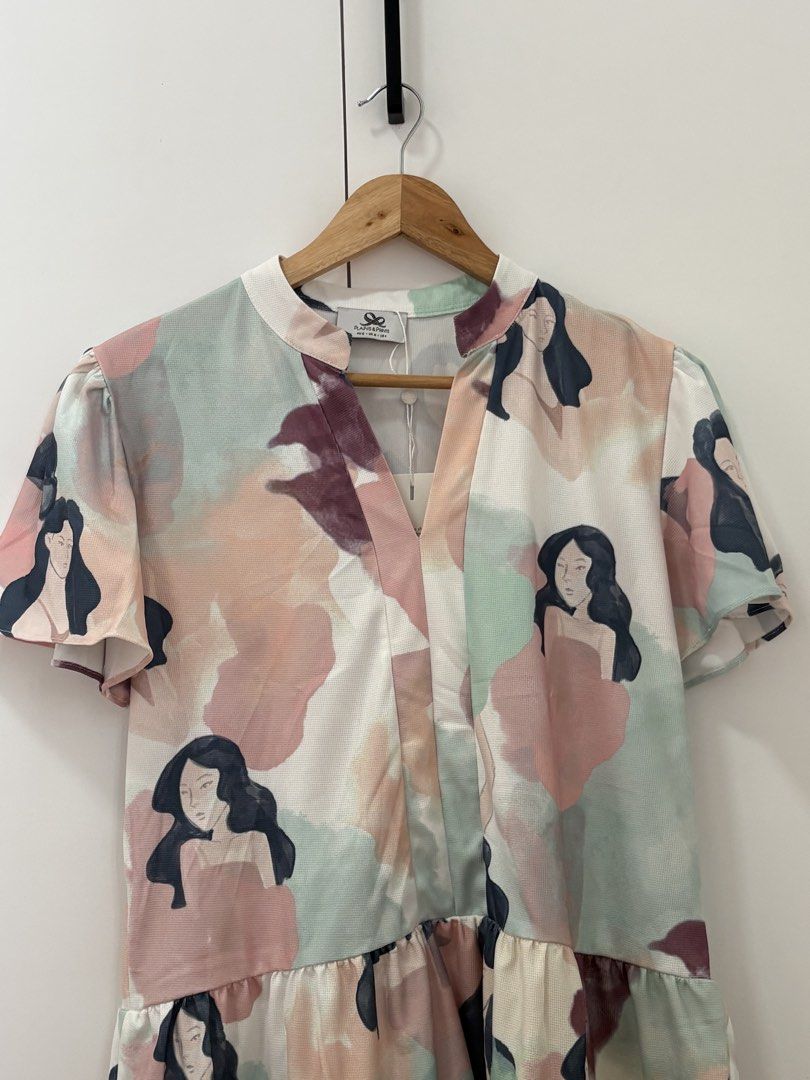 Plains & Prints Aleena S/S Dress Multi S (Category: Dresses) located in Bacoor. Submitted by pretticel (Listing ID 1444123507, Image 2). Description: Brand New With Tag: Bought in Alabang Town Center Cute Plains & Prints tiered dress, size S. Features abstract print with women's faces, short sleeves, and V-neck. Original tag attached..