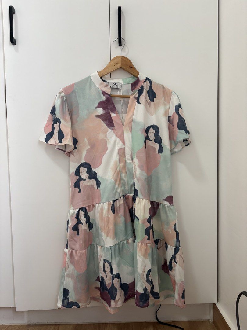 Plains & Prints Aleena S/S Dress Multi S (Category: Dresses) located in Bacoor. Submitted by pretticel (Listing ID 1444123507, Image 1). Description: Brand New With Tag: Bought in Alabang Town Center Cute Plains & Prints tiered dress, size S. Features abstract print with women's faces, short sleeves, and V-neck. Original tag attached..