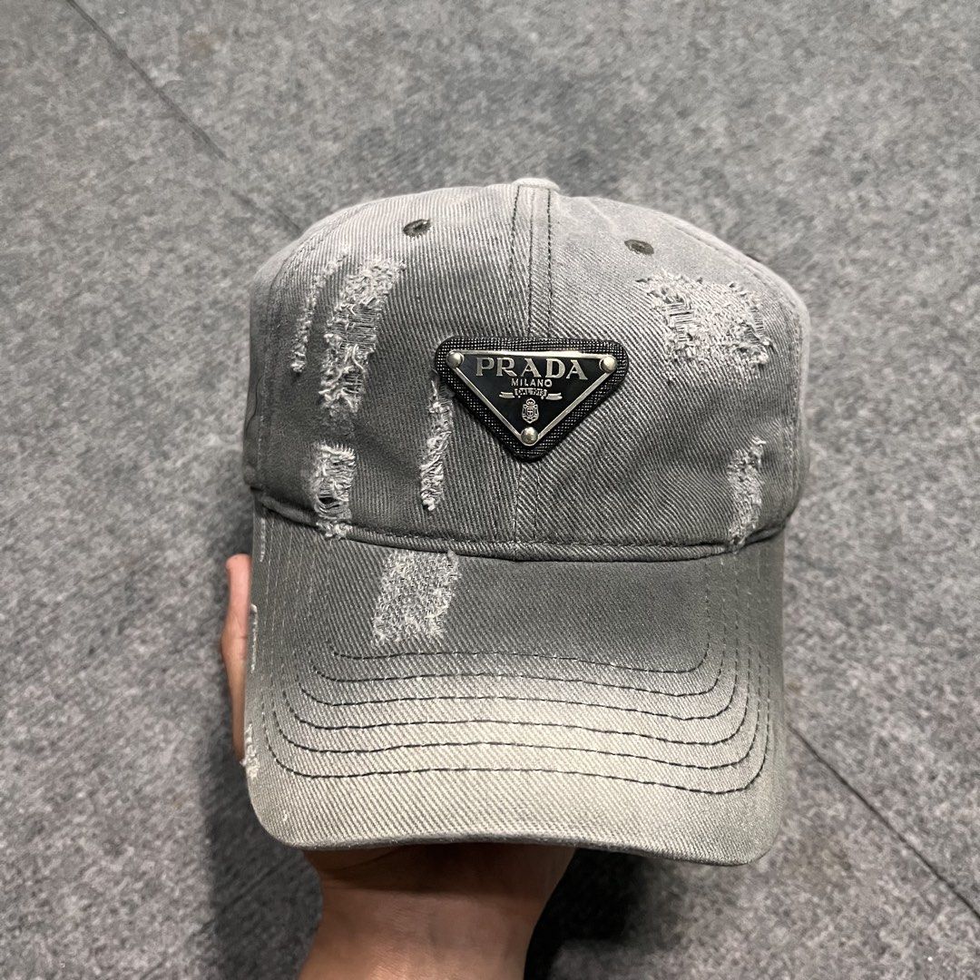 Prada Baseball Cap (Category: Caps & Hats) located in Argao. Submitted by rarecollective. (Listing ID 1444261359, Image 2). Description: Prada Baseball Cap •Size: Osfa •📐: •Condition: Good Condition •Color rate: 9.8/10 •Issue: Sign of usage •Price: 700.00🏷️📨 No Cod/Cop Mop: Gcash 📍Balisong, Argao, Cebu .