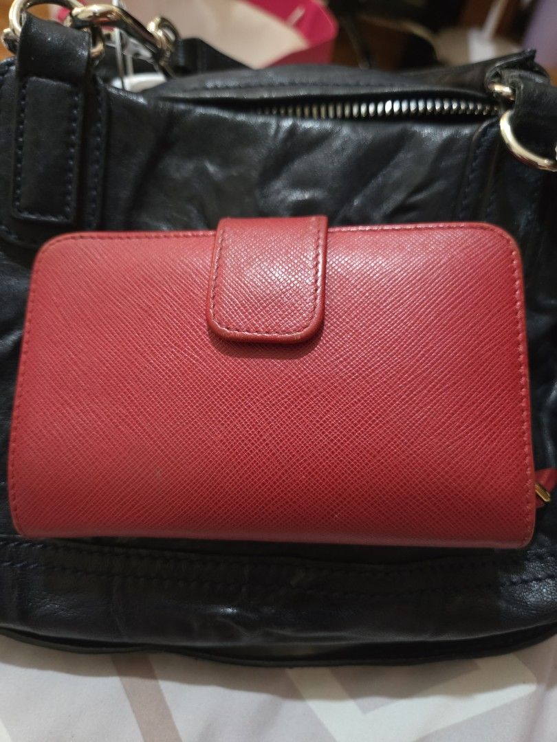 Prada Red Saffiano Leather Wallet (Category: Luxury Bags & Wallets) located in Quezon City. Submitted by jenxxaaron (Listing ID 1444182481, Image 3). Description: Original w/ authenticity card Negotiable.