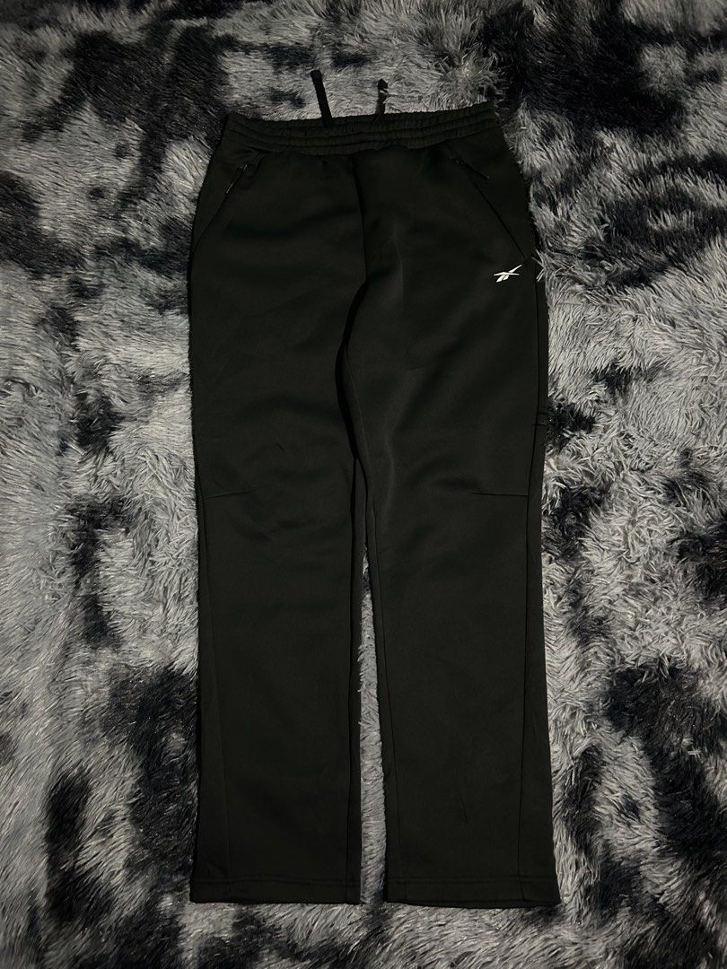 Reebok Track Pants Black W15 L40 Hem8 (Category: Joggers) located in Cadiz. Submitted by jaybatiller (Listing ID 1444223122, Image 2). Description: - Brand: Reebok - Color: Black - Size: XL - Material: 100% Polyester - Features: Pockets, Drawstring Waist - Inseam: 76cm - Ideal for: Sports, Casual Wear.