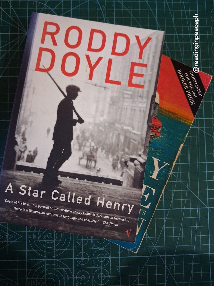 Roddy Doyle Books: The Van & A Star Called Henry (Category: Storybooks) located in Cavite. Submitted by readinginpeace (Listing ID 1444202327, Image 3). Description: - Two paperback novels by Roddy Doyle: 'The Van' and 'A Star Called Henry'. - 'The Van' was shortlisted for the Booker Prize. - 'A Star Called Henry' is praised for its Dublin setting and language. - Pages show some tanning and foxing due to age. - The spine of 'The Van' has some wea